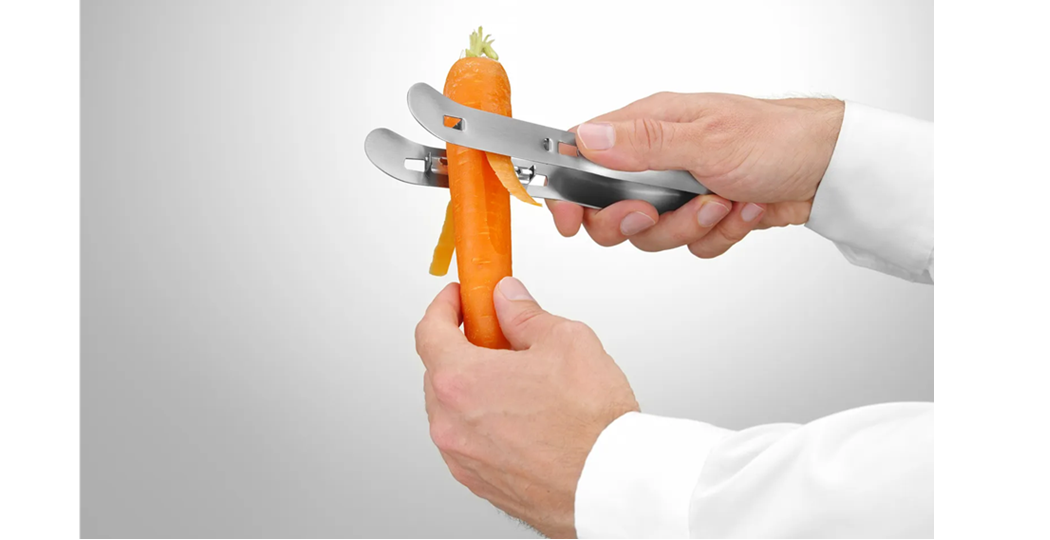 Effektiv skreller i rustfritt stål, perfekt for lange grønnsaker som asparges eller gulrot